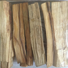 Load image into Gallery viewer, Palo Santo Smudge Stick | Energy Cleansing | Good luck | witchcraft | occult | metaphysical | spiritual | wicca | white witch | green witch | spells | tarot | pagan | herbs | coven | altar | moon | decor | candle | divination | secular | nature | santeria | gypsy | protection | love | anxiety | natural remedy | apothecary | magic | magik | magick | astrology | grimoire